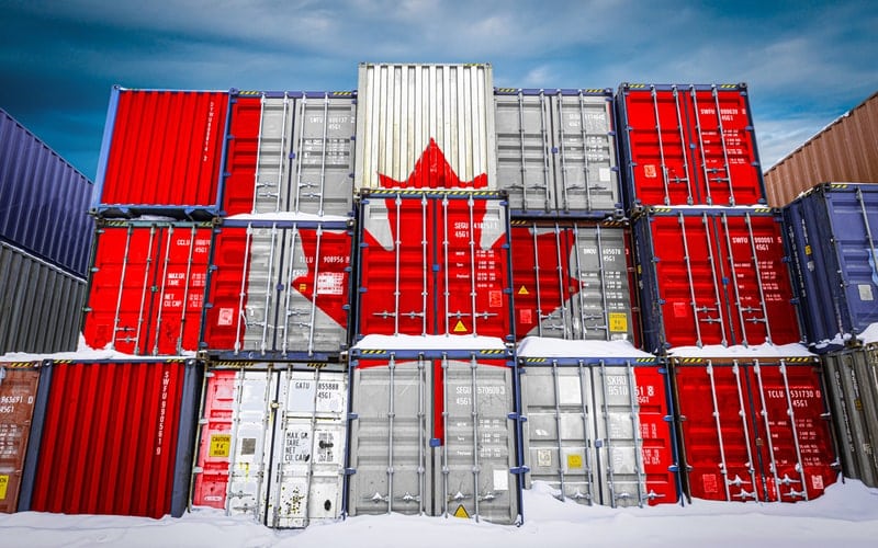Shipping containers placed on top of each other to create the Canada flag