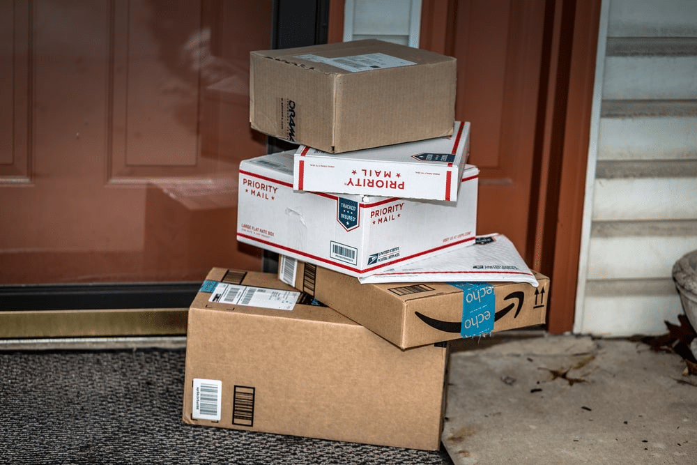 USPS packages delivered on the front door.