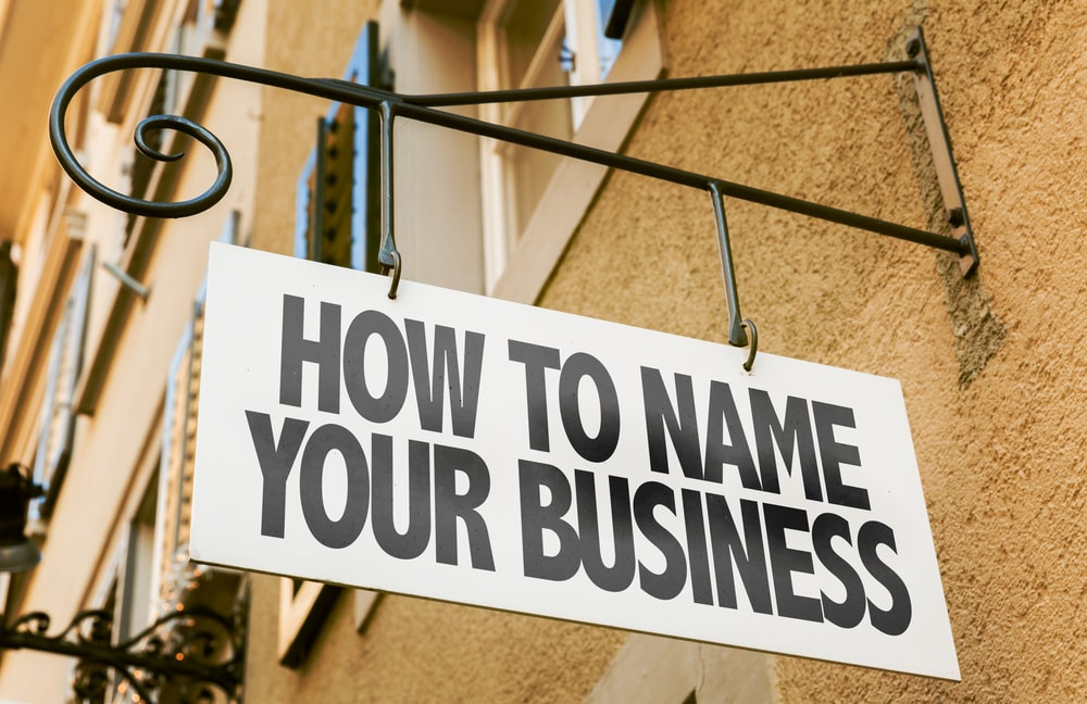 "HOW TO NAME YOUR BUSINESS" sign.