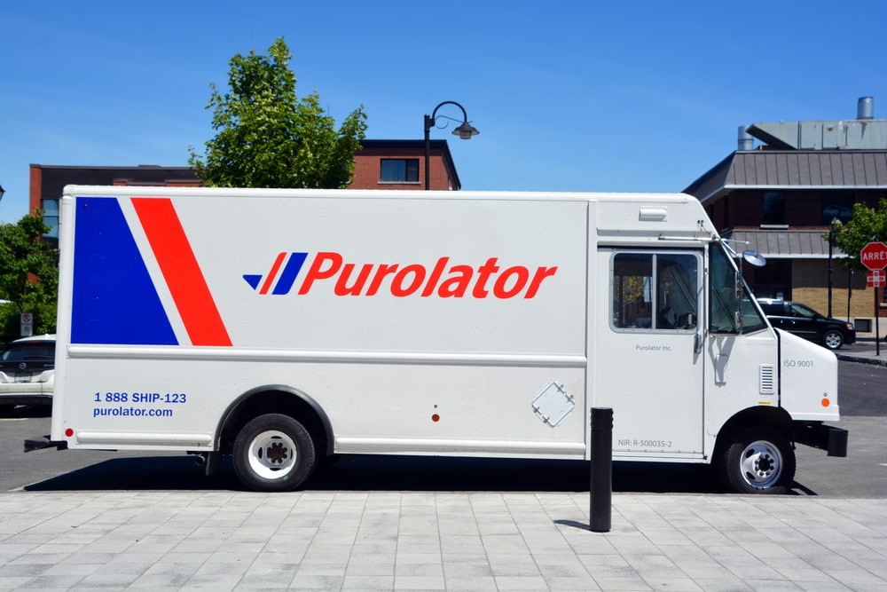 a white Purolator truck