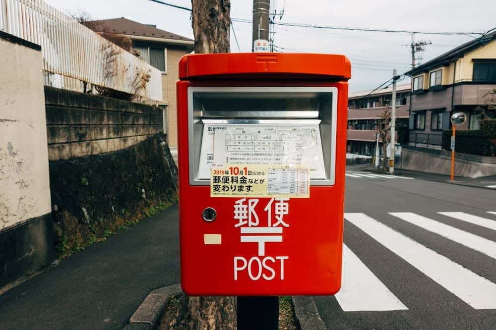 A red Chinese mailbox